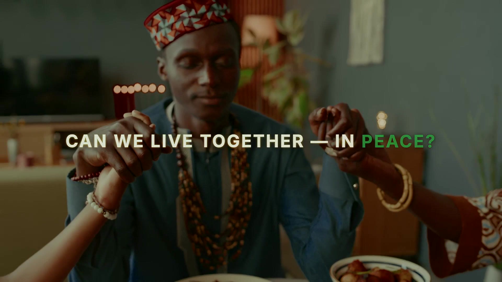 A Nigerian elder looks into the camera, a frame from The Alaafia Project
